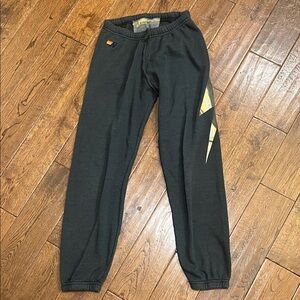 Black Jogger Pants with Gold Accents aviator nation small